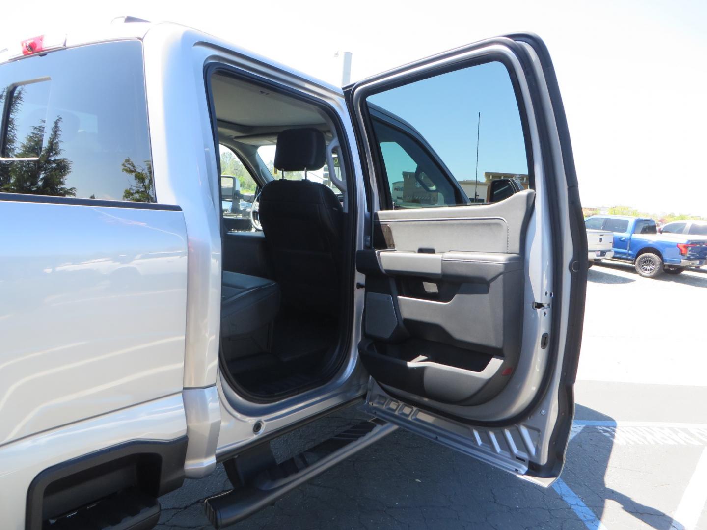 2023 SILVER /BLACK Ford F-350 SD Lariat Crew Cab 4WD (1FT8W3BT2PE) with an 6.7L V8 DIESEL engine, 10 speed automatic transmission, located at 2630 Grass Valley Highway, Auburn, CA, 95603, (530) 508-5100, 38.937893, -121.095482 - Features a BDS 5" radius arm suspension system, Fox Shocks, 37" Nitto Ridge Grappler tires, 20" Fuel Clash wheels, and Camper tie downs. - Photo#59